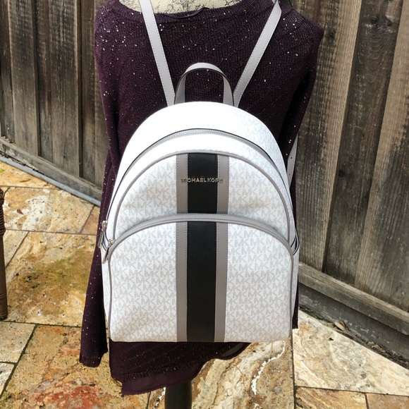 Michael Kors Handbags - NWT Michael Kors LG striped abbey backpack